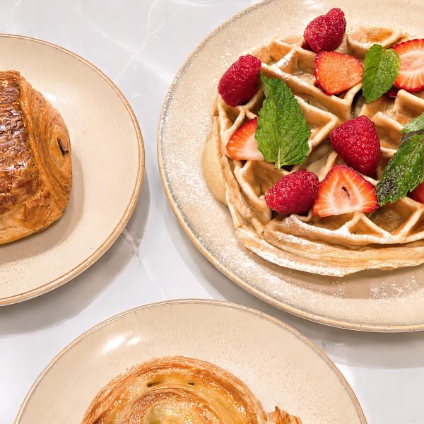 Brunch with waffles, fresh berries and pastries at Maison des Princes in Midtown Manhattan NYC